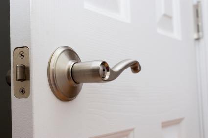 Lever door handle with child safety lock