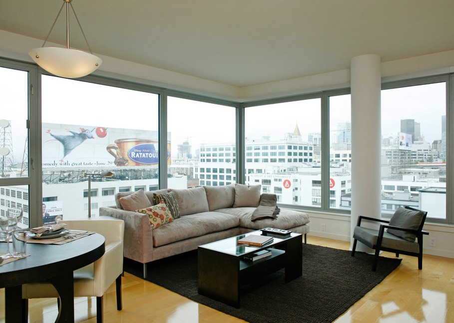 microfiber sofa in a room with large windows