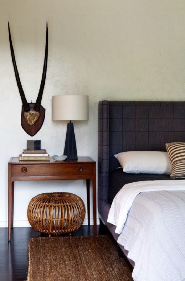 bedroom with brown area rug