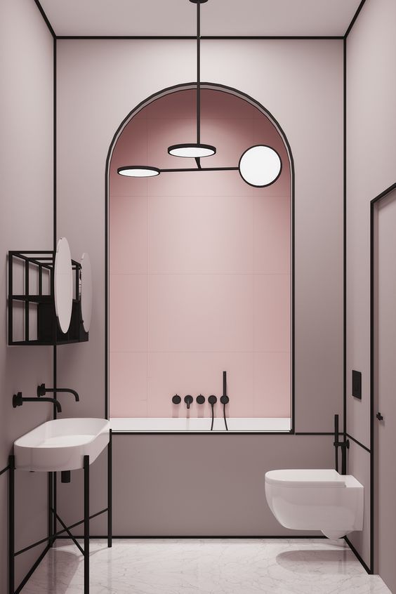 light pink bathroom with black accents