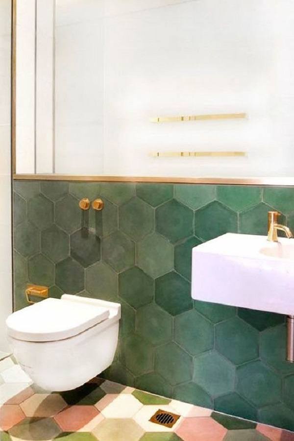bathroom with pink and green hexagon tiles