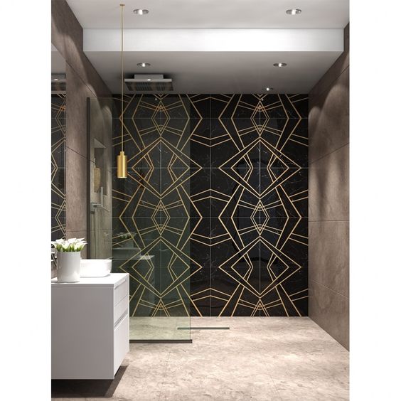 bathroom with marble and brass tile