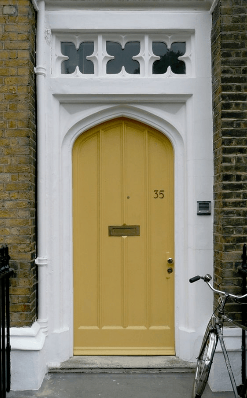 soft yellow front door
